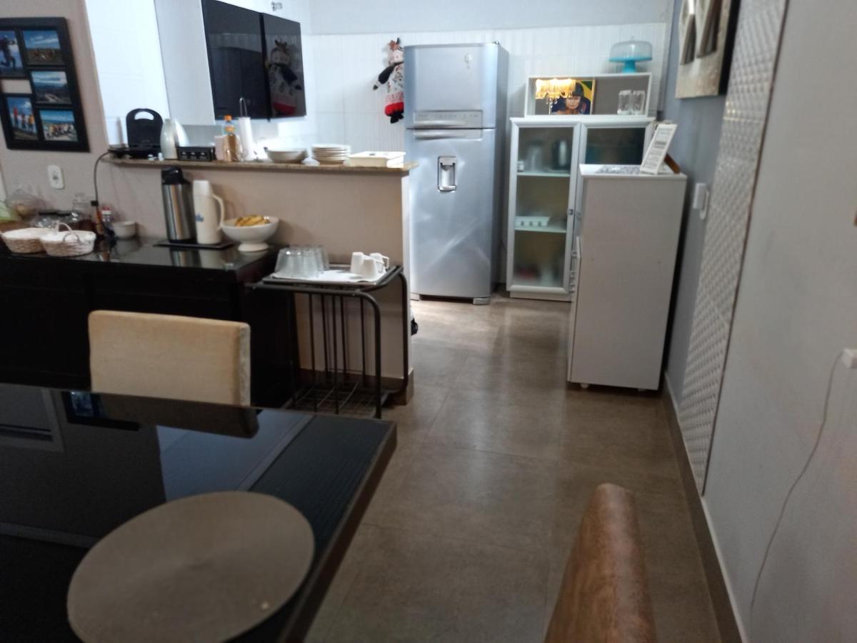 Pousada Da Gi Suites E Turismo ชาปาดา ดอส กิมาไรส์ ภายนอก รูปภาพ