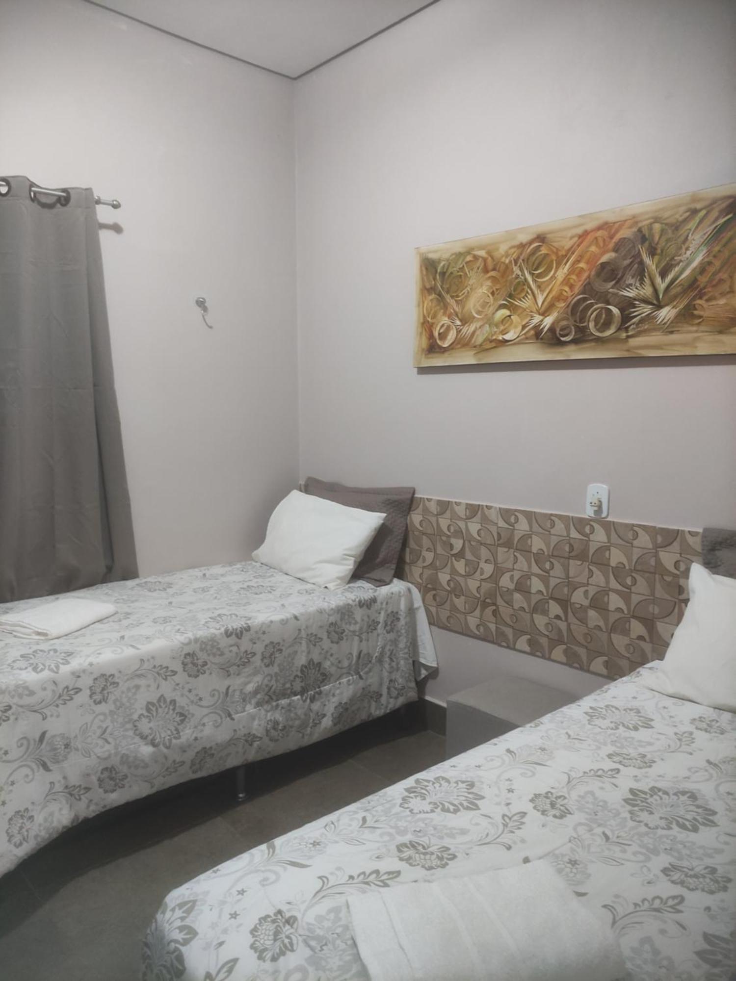 Pousada Da Gi Suites E Turismo ชาปาดา ดอส กิมาไรส์ ห้อง รูปภาพ
